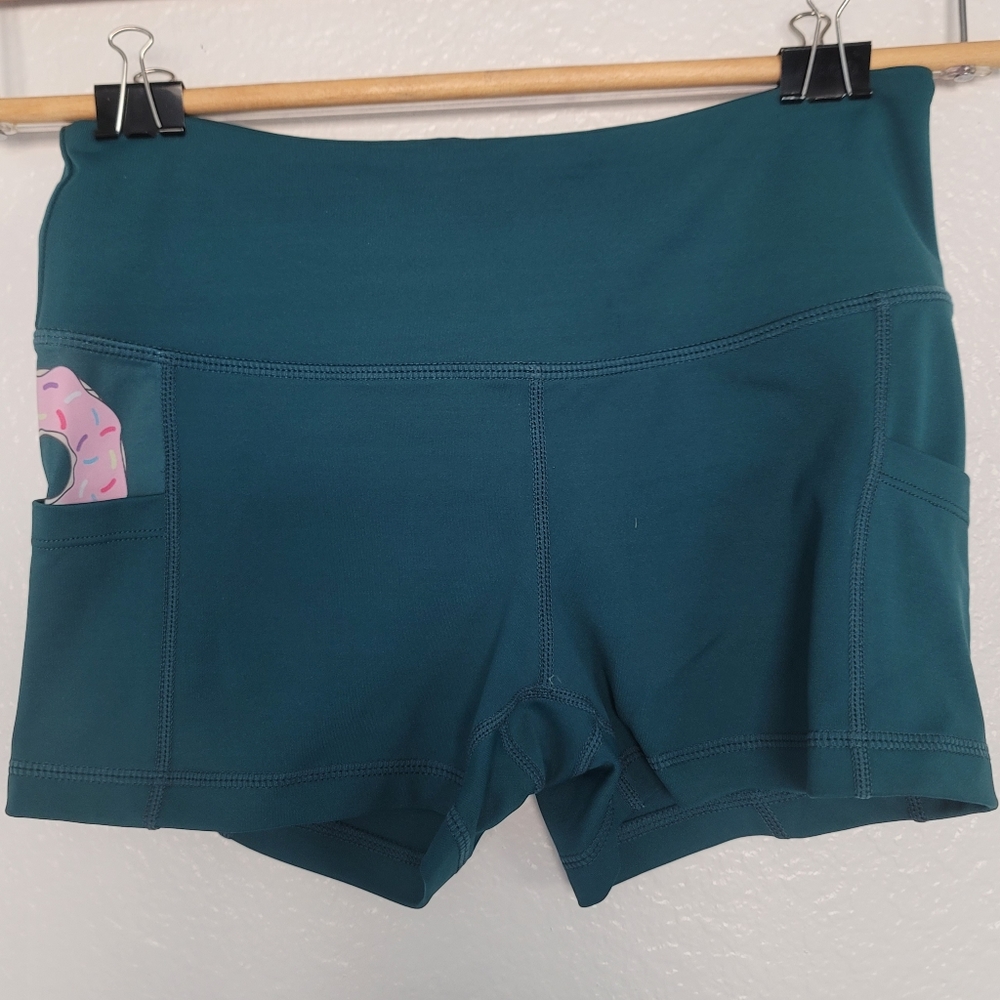 Teal Feed Me Fight Me donut pocket shorts